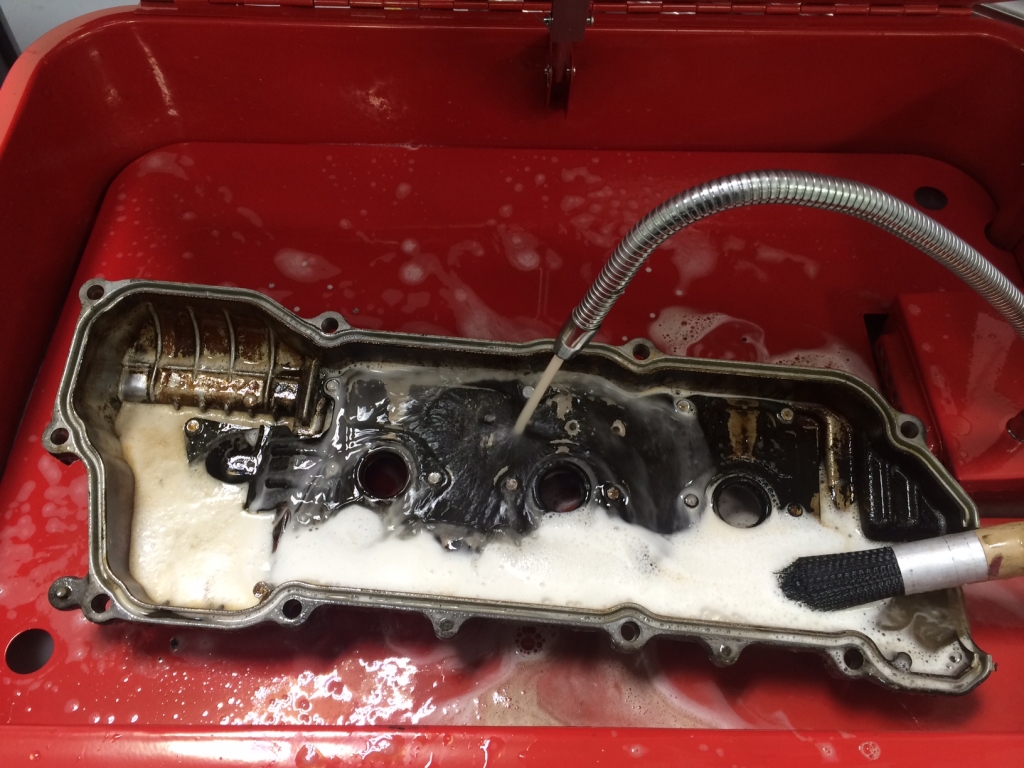 Cleaning out valve cover