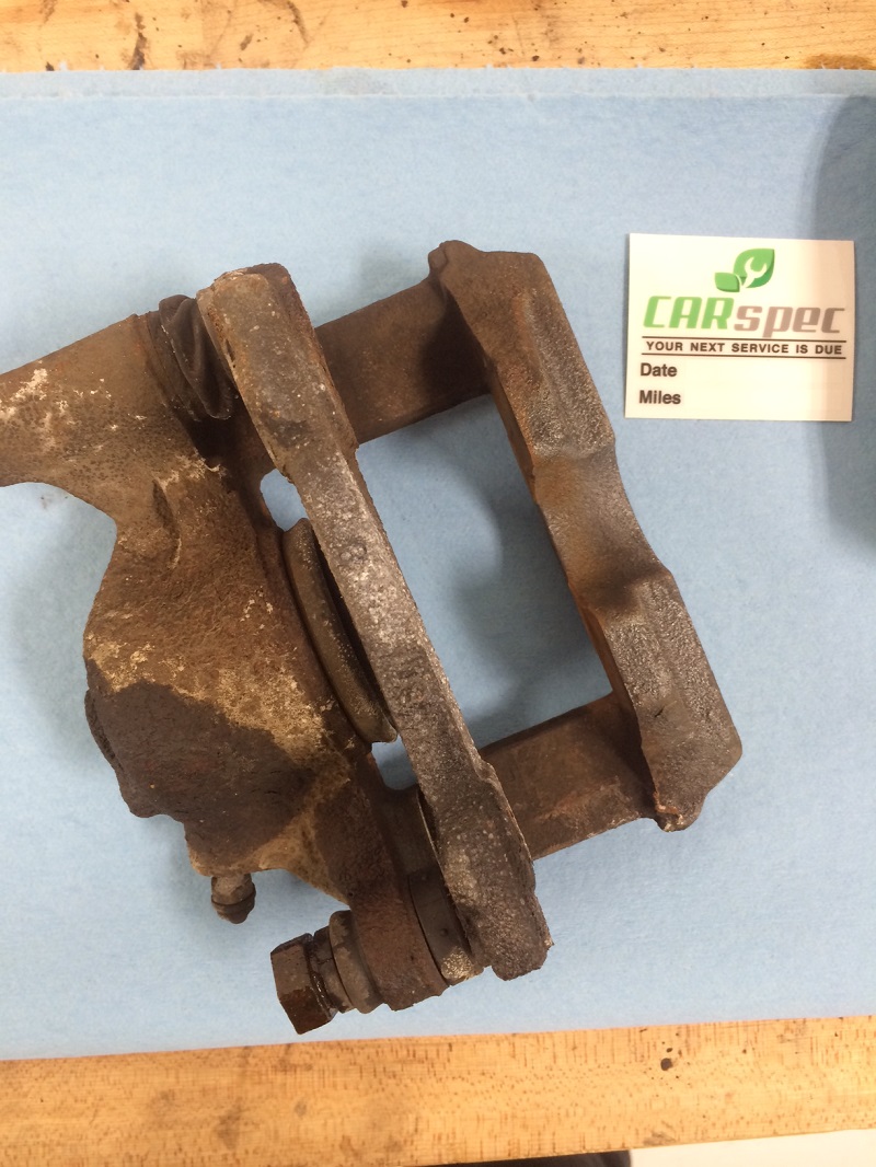 A seized rear caliper from an IS250/IS350